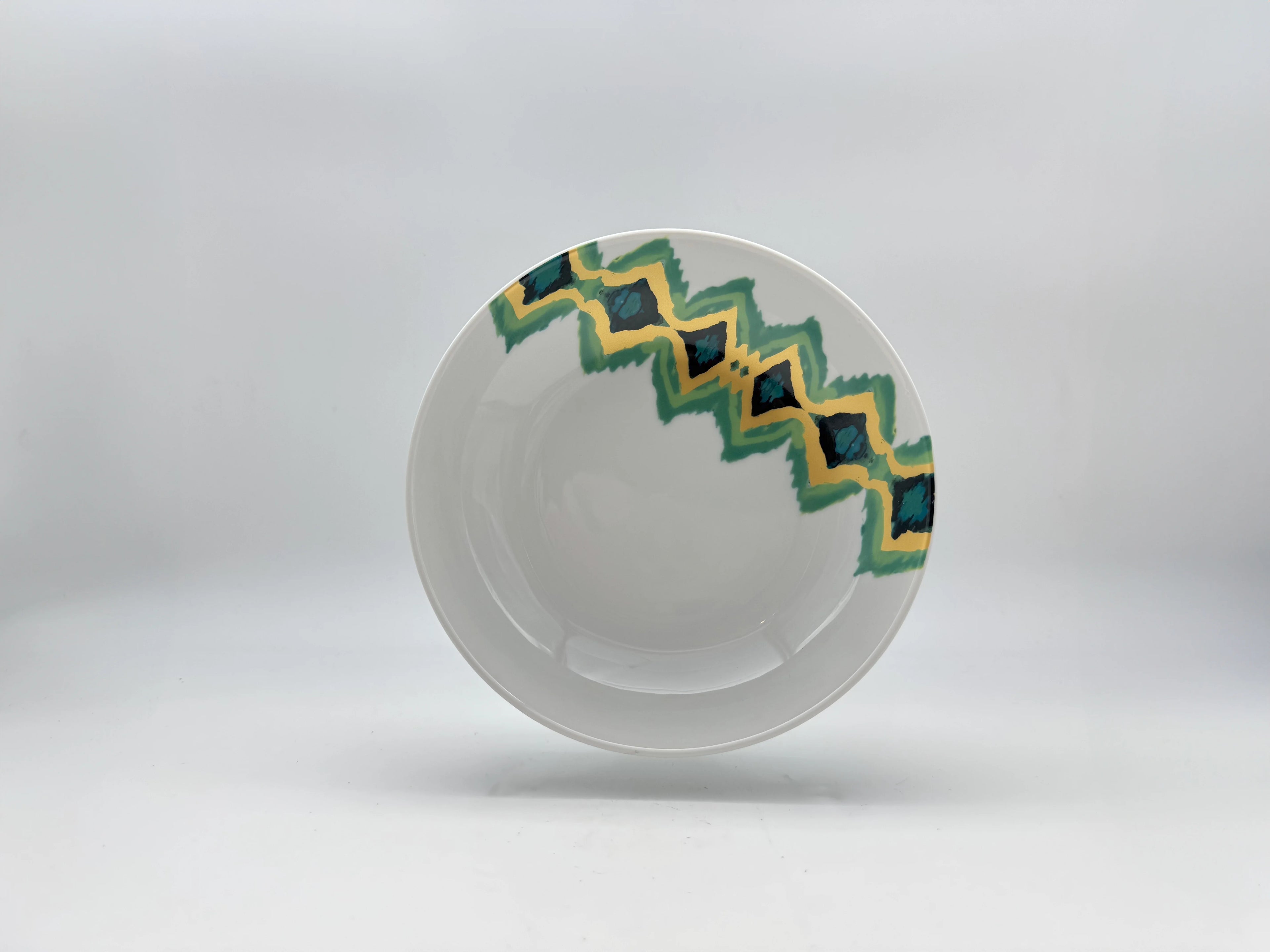 Aqua Zigzag porcelain deep plate (20 cm) with teal and yellow border pattern
