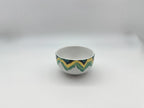 Aqua Zigzag porcelain bowl showing teal and yellow zigzag artwork
