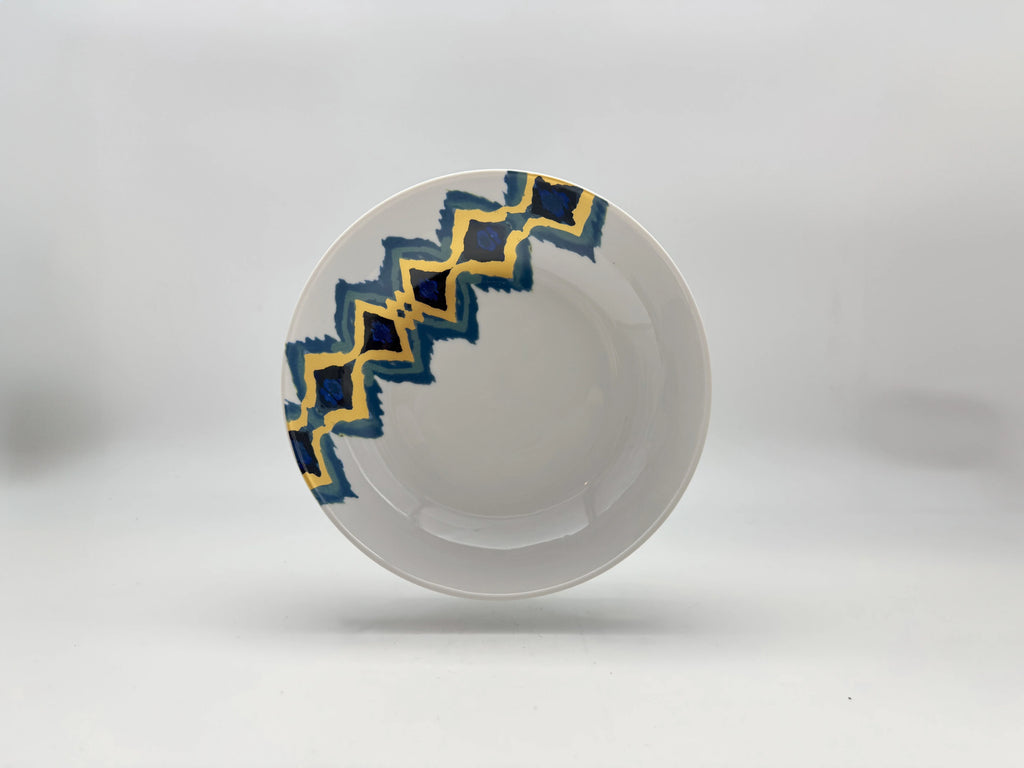Blue Sahara deep plate with blue and gold patterned rim