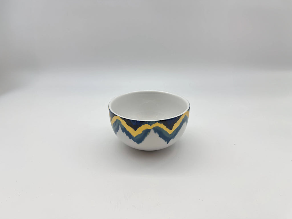 Angled view of Blue Sahara small bowl with patterned design