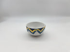 Angled view of Blue Sahara small bowl with patterned design