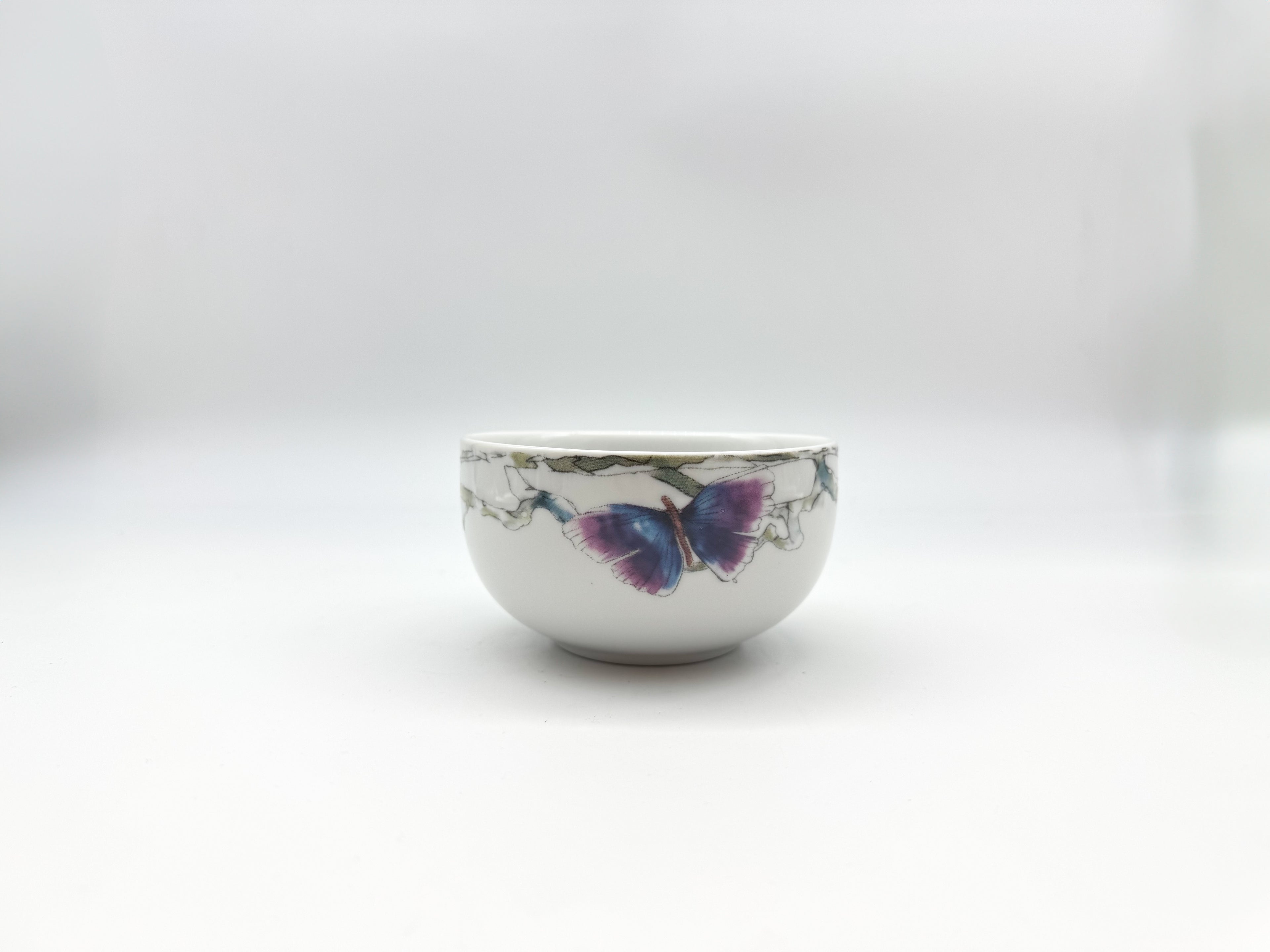 Porcelain soup bowl from the Butterfly Collection featuring colorful butterfly artwork.
