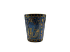 Porcelain mug with Egyptian pharaoh design and hieroglyphics in blue and gold.