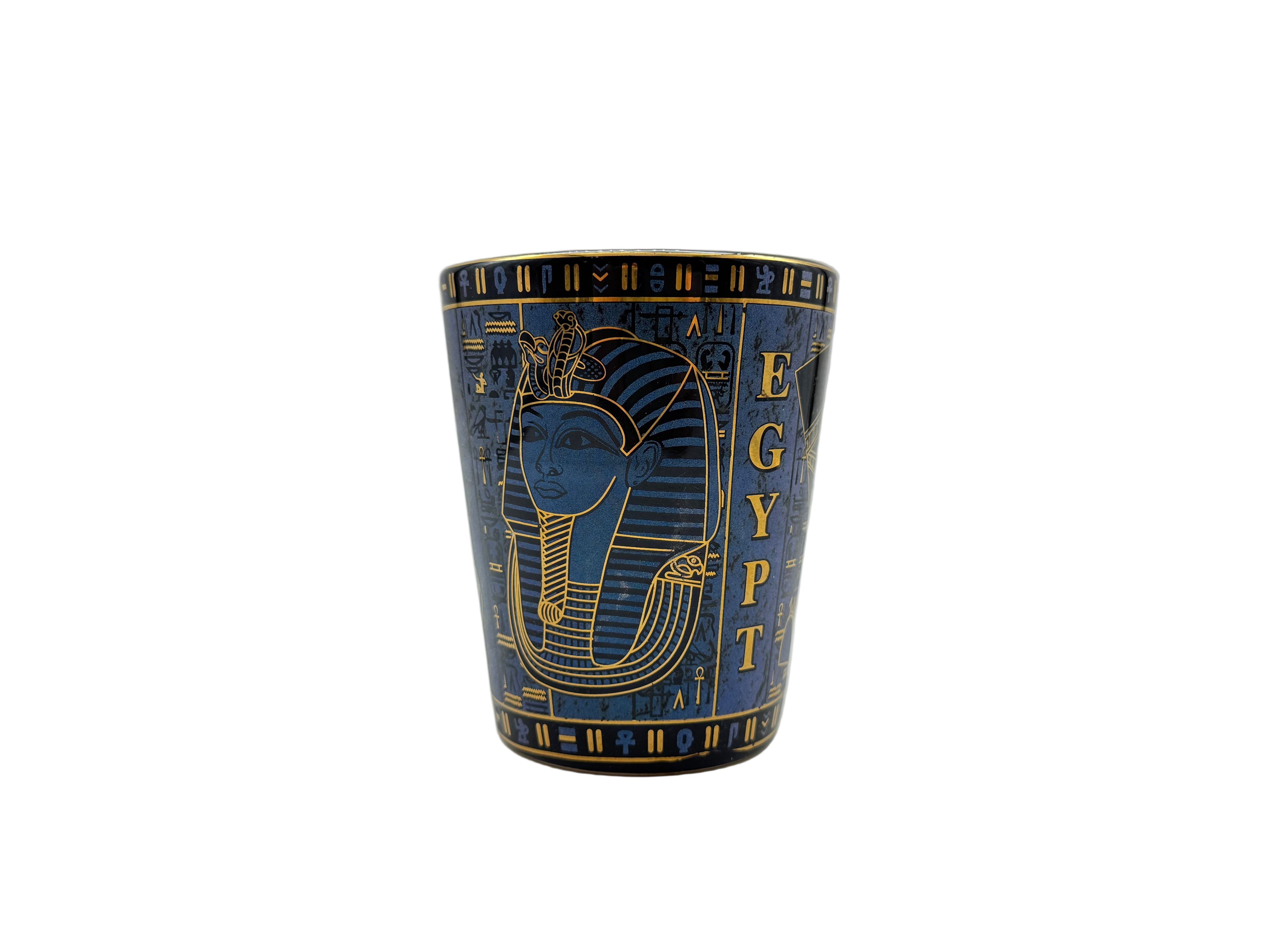 Porcelain mug with Egyptian pharaoh design and hieroglyphics in blue and gold.