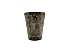 Porcelain mug with Egyptian pharaoh design and hieroglyphics in bronze and gold.