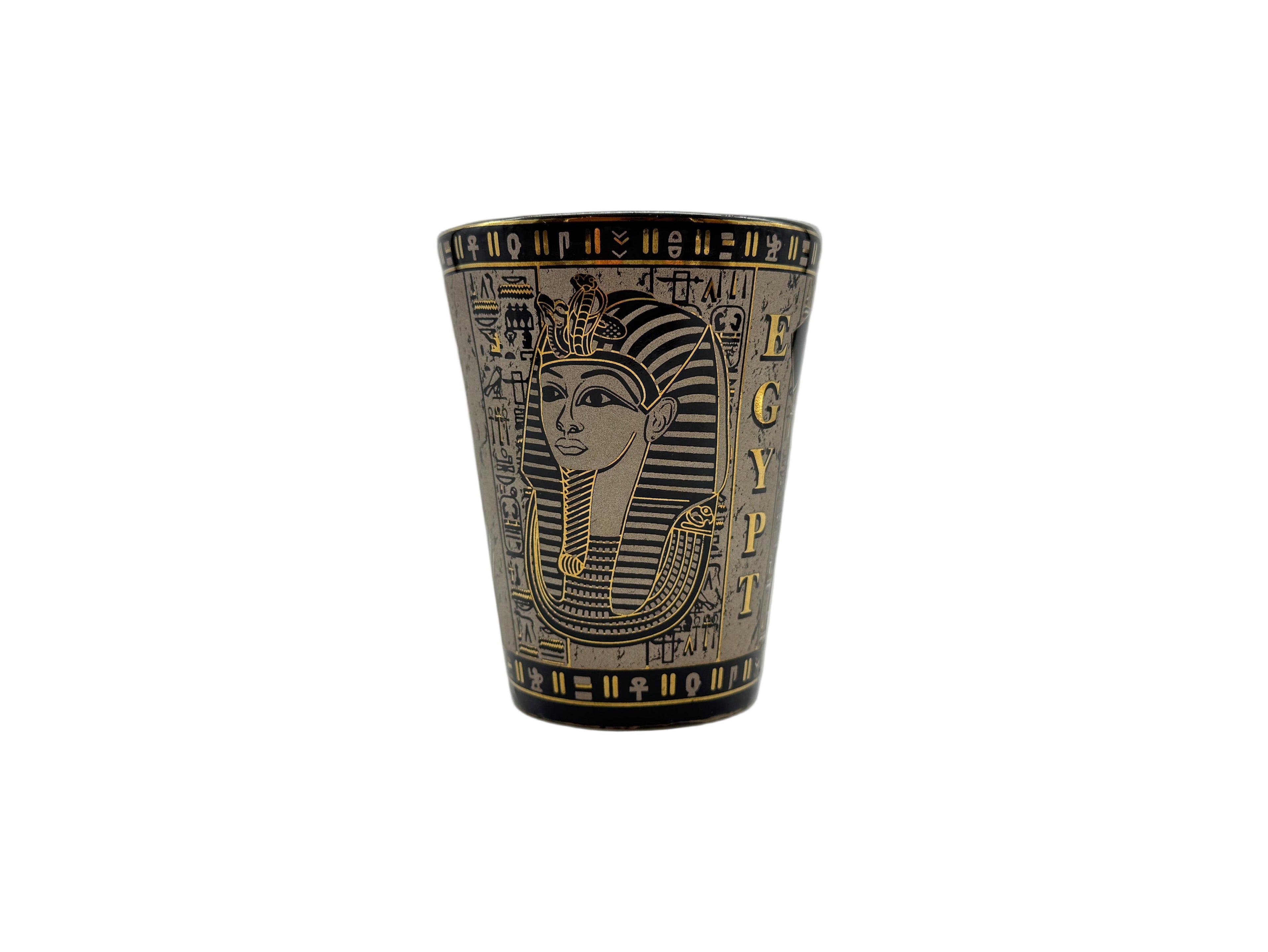 Porcelain mug with Egyptian pharaoh design and hieroglyphics in bronze and gold.