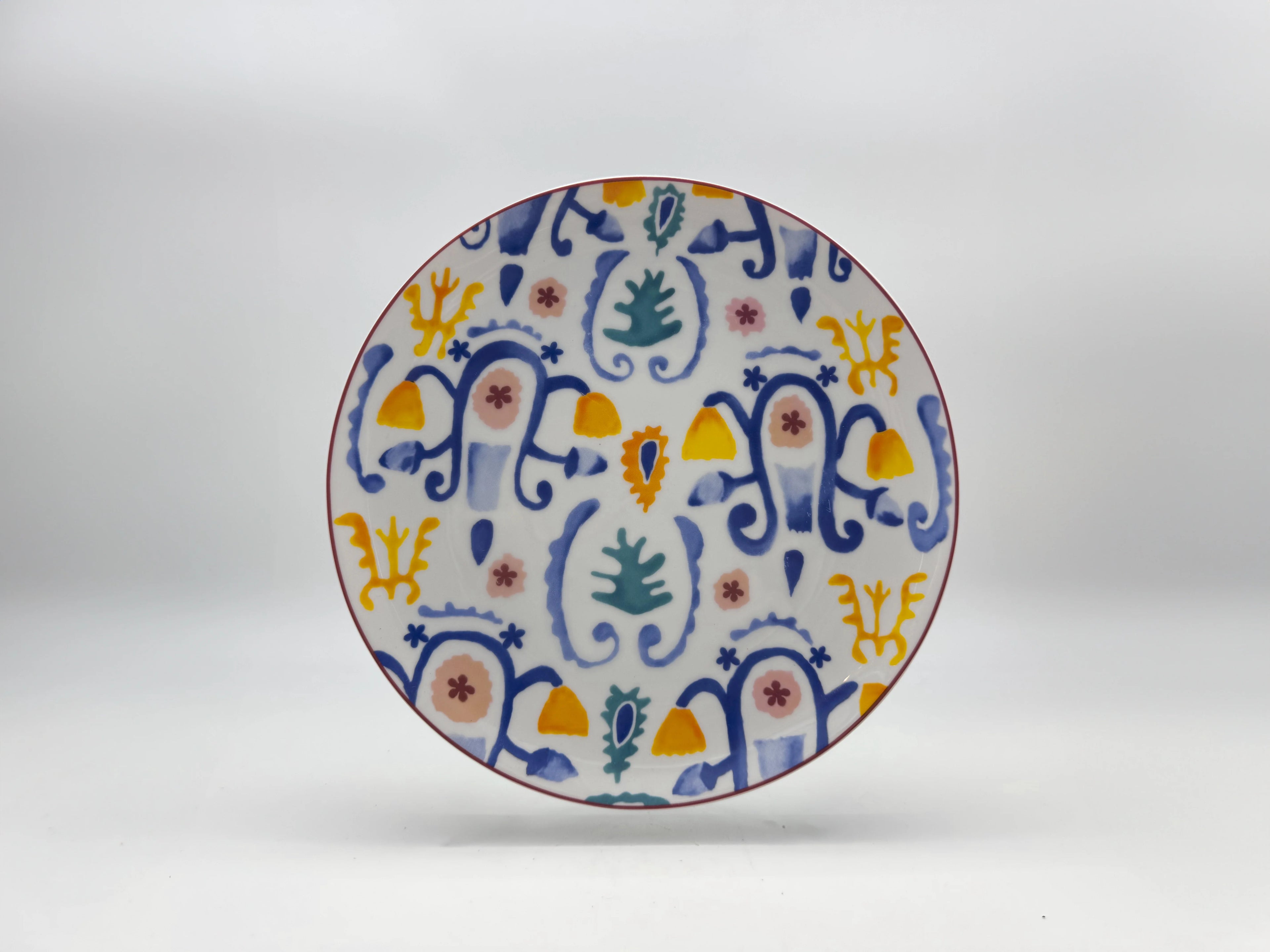 Mosaic Bloom dinner plate with colorful floral and geometric pattern