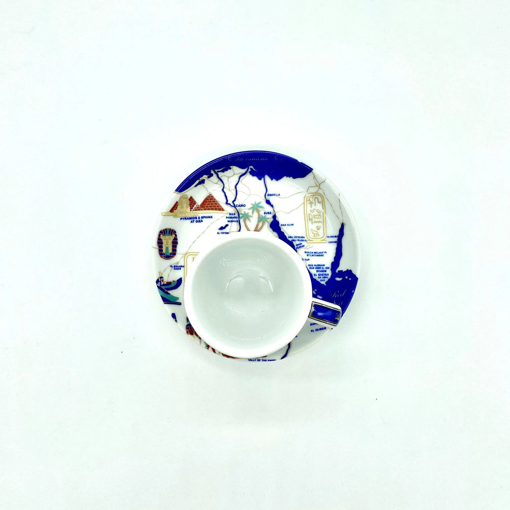 Top-down view of the Nile Valley Map cup placed on its matching plate with illustrated Egypt map artwork