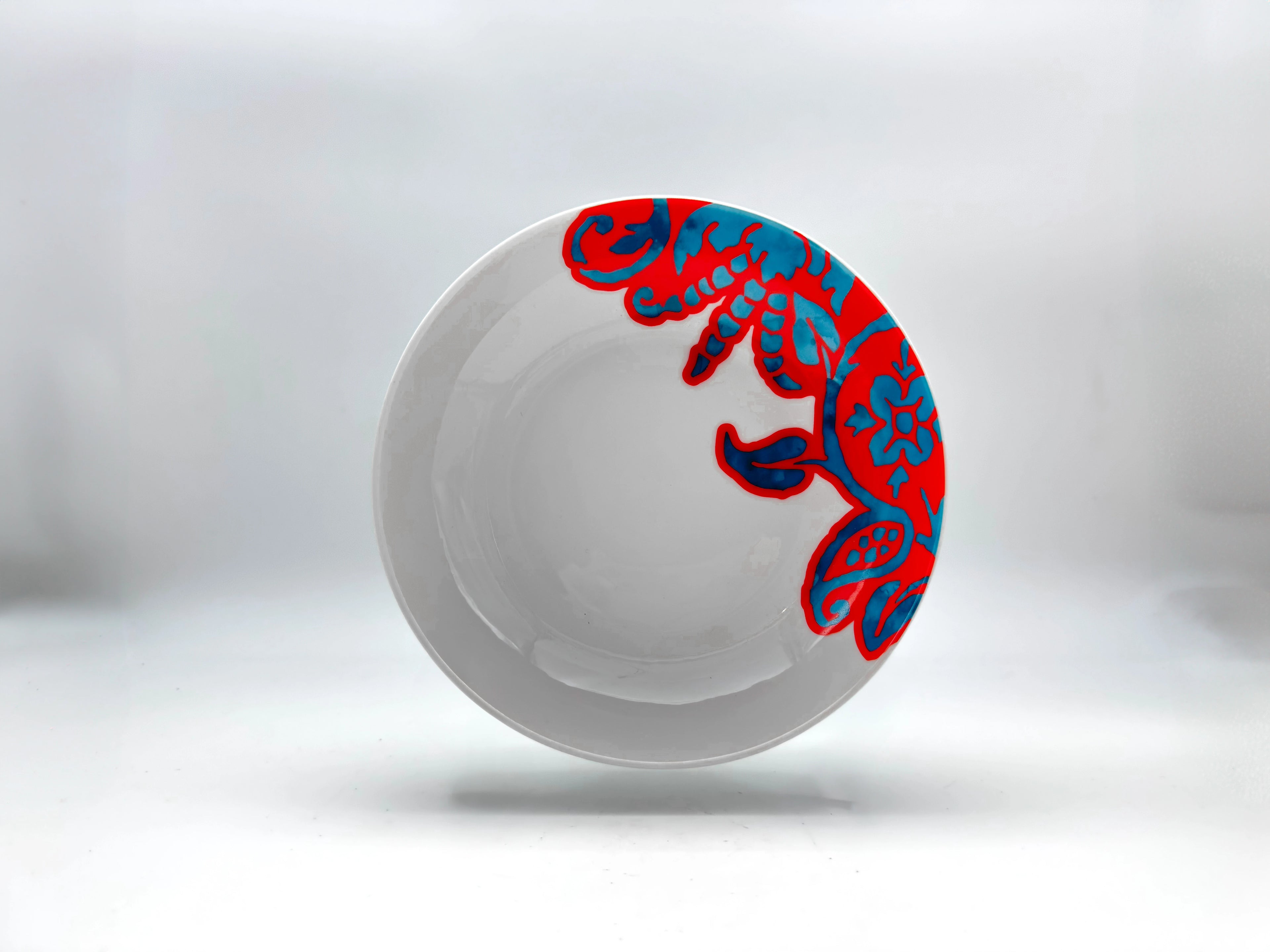 Red and blue patterned porcelain deep plate