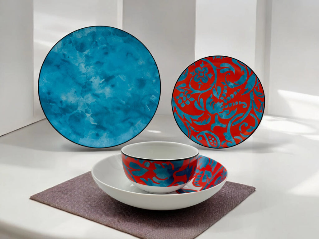 Lifestyle photo of red and blue porcelain dinnerware set