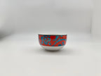 Red and blue patterned porcelain soup bowl front view