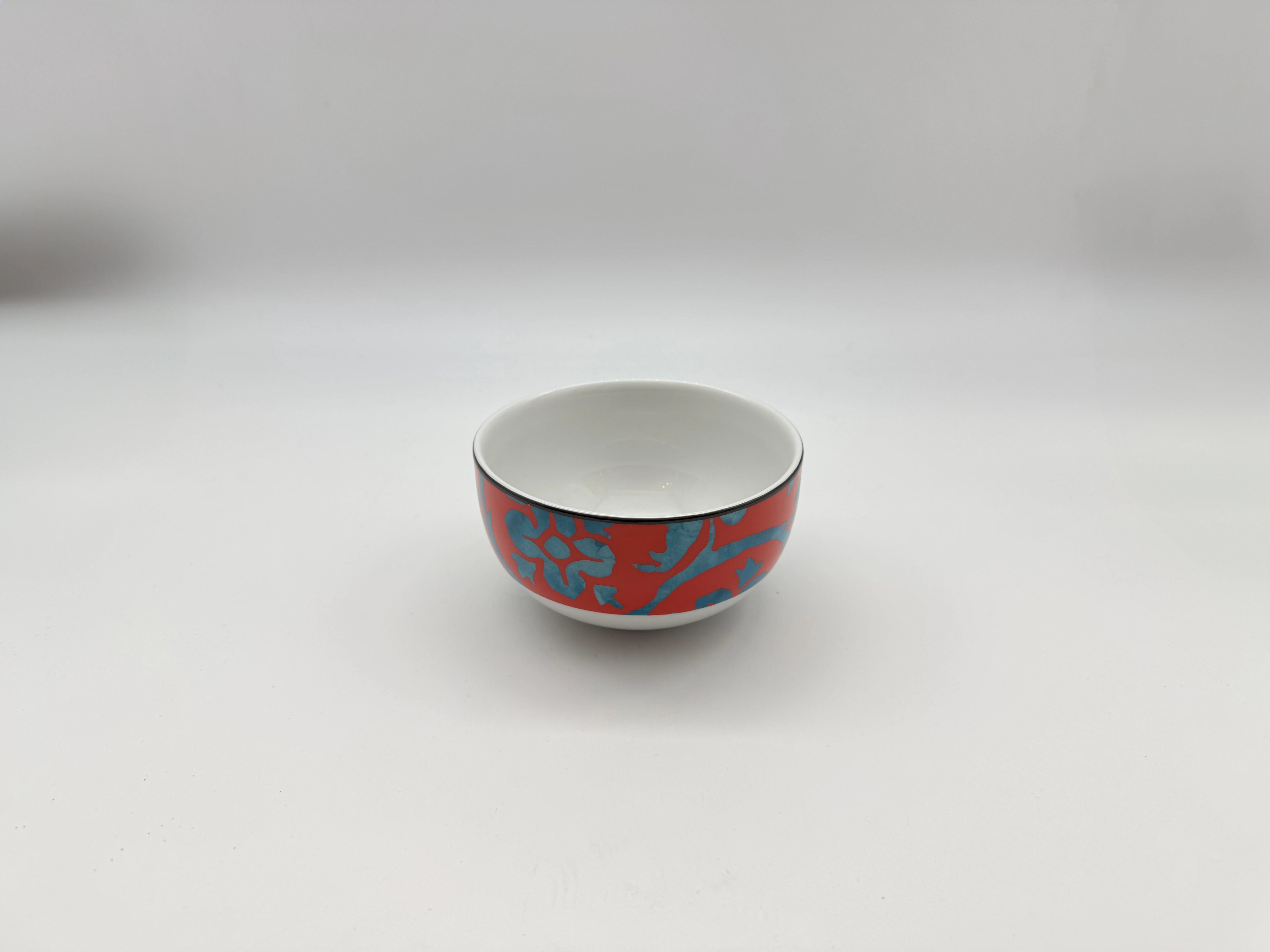Red and blue patterned porcelain soup bowl