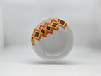 Sunset Zigzag porcelain deep plate with decorative geometric orange design.