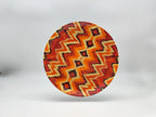Sunset Zigzag porcelain dinner plate with orange and red geometric pattern