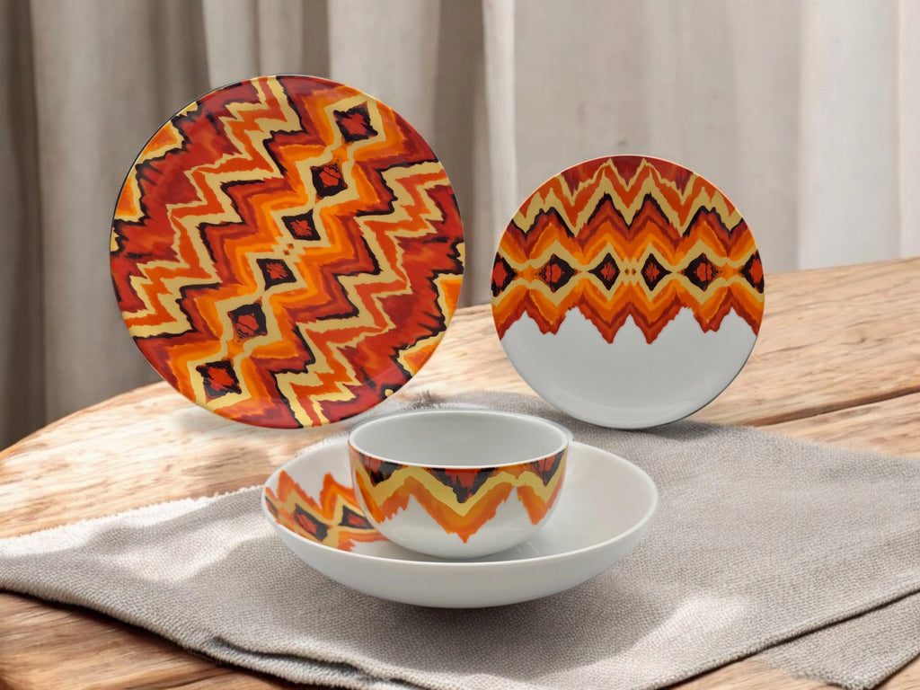 Lifestyle photo of the Sunset Zigzag porcelain dinnerware set displayed on a table